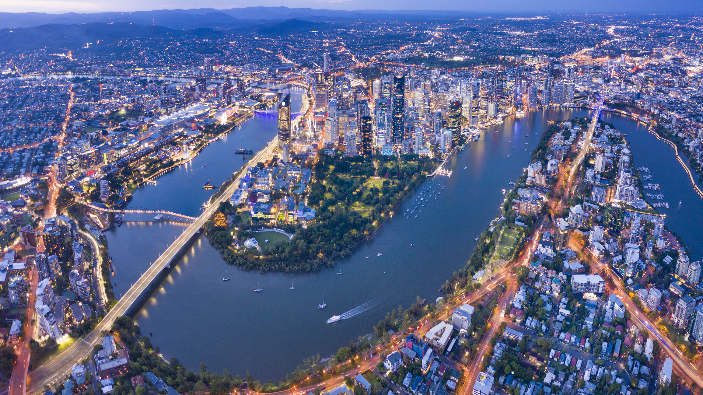 Brisbane Skyline Night Panorama with the famous illuminated Story Bridge