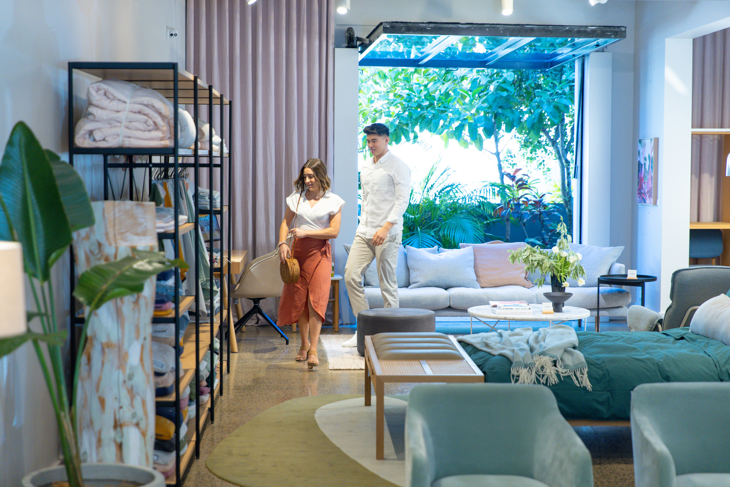Couple walking through Jardan furniture store Couple walking through Jardan furniture store