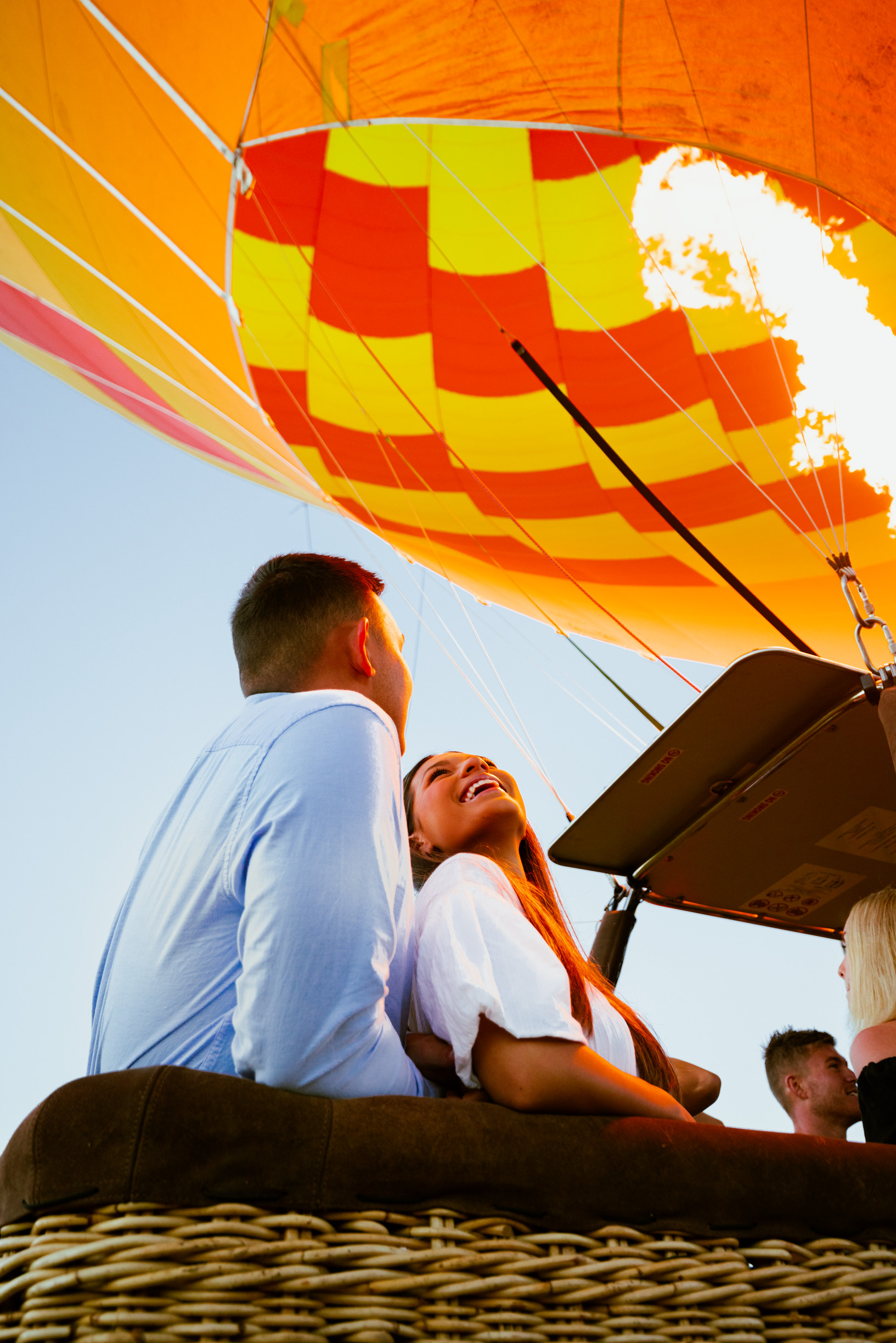 Couple having fun in a sunrise balloon ride over the Gold Coast Hinterland Couple having fun in a sunrise balloon ride over the Gold Coast Hinterland