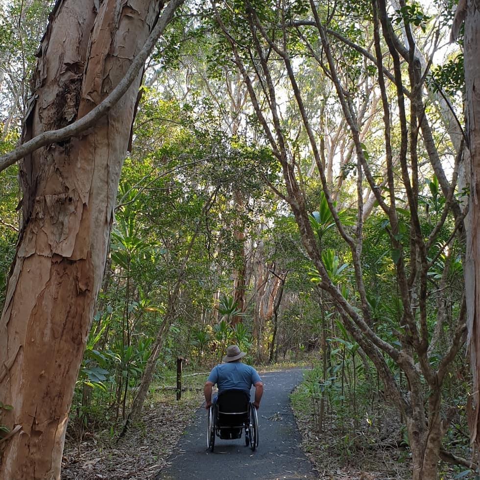 Man in wheelchair explores the Kommo Toera Trail, near Mackay